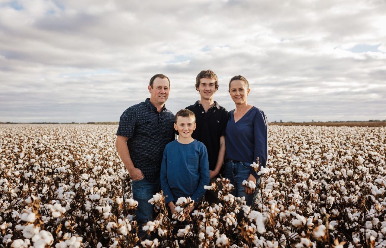 PHOTO: Coleambally cotton farmer Jenna Davis, with her husband Mick and children Chaise and Sam.