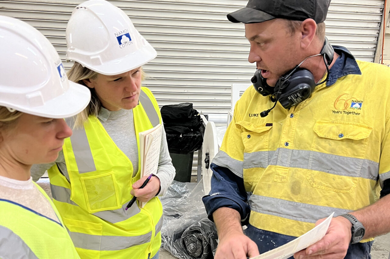 Researchers Oliver Bryant and Lucy King with Luke from Namoi Cotton Wee Waa gin